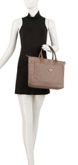Travel tote with trolley sleeve
