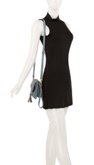 Tassel front flap triple entry wristlet crossbody