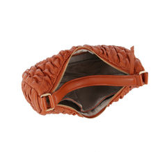 Quilted half moon shoulder bag